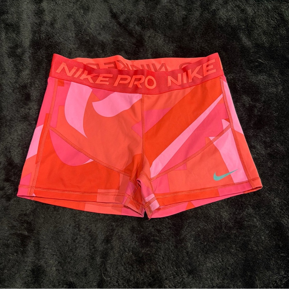 Nike Women's Athletic Shorts in Red and Pink